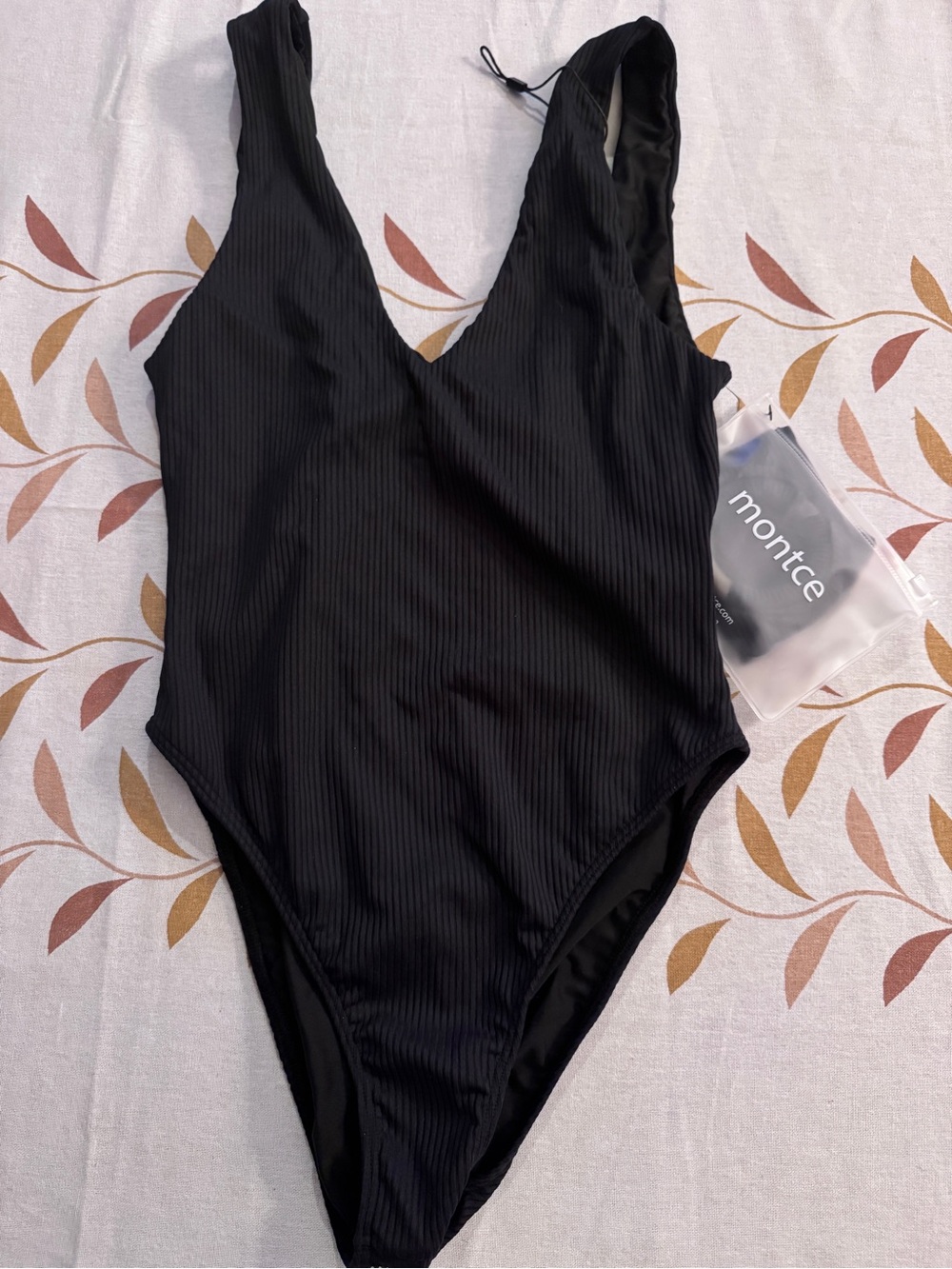 Montce Black Ribbed V-Neck One-Piece
